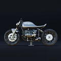 Vintage Metallic Silver Motorcycle Featuring Round Headlight Single Seat And Spoked Wheels
