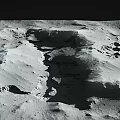 Moon Landscape Displaying Crater Formations Undulating Terrain and Rugged Surface with Natural Shadow Patterns