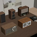 Vintage Style Wooden Audio Devices Including Speakers And Radios On Table