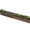 Decorative Garden Planter Boxes with Lush Green Plants and White Flowers Along Wooden Path
