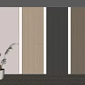 Modern Hinged Doors in Various Wood Tones with Potted Plant and Wooden Floor Interior