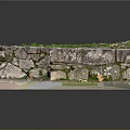 Natural Stone Steps And Walls Decorated With Moss And Scattered Fallen Leaves