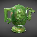 Green Ceramic Tea Set with Intricate Carved Dragon Motif and Decorative Handles on Base
