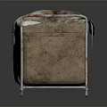 Metal Frame Basket With Dirty Stained Cloth On Reflective Surface