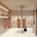 Modern Clothing Store Interior With Dresses On Display Racks Cashier Counter And Bright Lighting