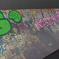 Colorful Graffiti Art On Textured Vintage Wall With Green And Pink Patterns