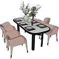 Modern Dining Table Set with Oval Marble Tabletop Pink Chairs Vase Branches and Green Plant