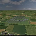 Aerial Rural Landscape with Green Farmland Neat Fields Distant Hills and White Clouds