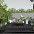 Traditional Garden Landscape With Rockery Water Feature Green Plants And Paved Courtyard