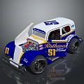 Blue And White Rothmans 51 Vintage Race Car With Open Hood And Exposed Engine