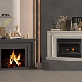 Modern Interior Featuring Dark And White Fireplaces With Burning Flames And Mantel Decor Items