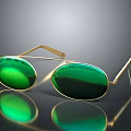 Elegant Gold Jewelry With Green Lenses And Reflective Frame Design