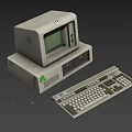 Vintage Computer Setup Featuring Green Screen CRT Monitor Keyboard And Gray Main Unit