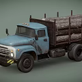 Old Blue Truck Loaded With Stacked Wood Logs For Building Materials