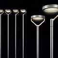 Modern Outdoor Lights With Silver Poles And Round Shades For Night Illumination