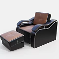 Modern Single Sofa With Black Leather Frame Brown Cushions And Matching Ottoman