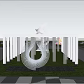 Modern Metal Sculpture In Outdoor Plaza With Green Grass And Trees