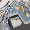 Outdoor Wicker Sofa With White Frame Blue Cushions Orange Beige Pillows And Coffee Table