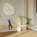 White Irregular Shaped Clock Hanging On Beige Wall With Wooden Bench And Blue Rabbit Decor