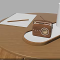 Wooden Radio Audio Device On Wooden Tabletop With Notebook Pencil And White Cup