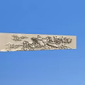 Intricate Metal Carving With Floral And Bird Patterns On Decorative Panel