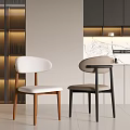 White And Beige Single Chairs With Wooden And Black Metal Legs In Modern Interior