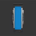 Gray Metallic Industrial Component With Blue Vertical Panel And Textured Surface