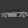 Silver Sports Car With Black Roof Aerodynamic Body And Red Brake Calipers