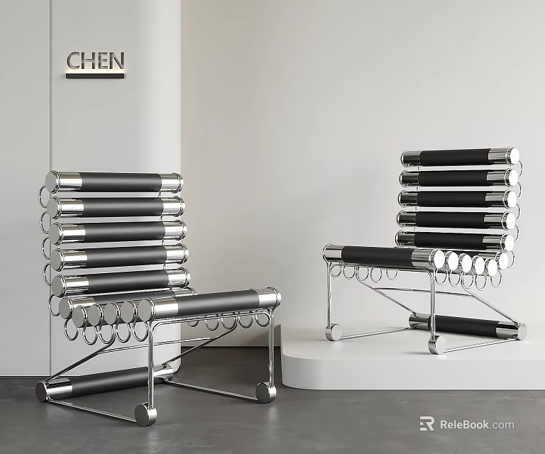 Sleek Modern Metal Lounge Chairs With Black Backrest And Silver Ring Accents 3d model 