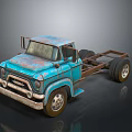 Vintage Blue Rusty Truck Chassis With Classic Front Design And Wheels