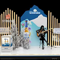 Guldkiss Christmas Photo Spot With Beer Bottle Guitar Player And Decorative Trees