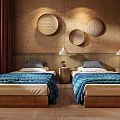 Hotel Guest Room Featuring Twin Beds Blue Bedspreads And Circular Wall Decorations