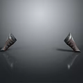 Two Brown Armor Vambraces with Metallic Decorations on Smooth Gray Reflective Surface