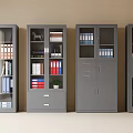 Four Gray Office File Cabinets With Organized Folders Books And Decorative Items