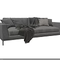 Cozy Gray Two Seater Sofa With Textured Pillows And Blankets For Living Room