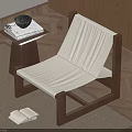 Modern Wooden Frame Accent Chair with White Upholstery Side Table and Books on Wooden Floor