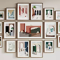 Abstract Paintings Various Frames Hanging On Wall Modern Minimalist Style Soft Colors Arch Stairs Plants