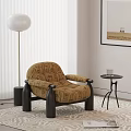 Brown Patterned Single Sofa With Black Armrests Legs And Side Table Floor Lamp