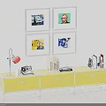 Yellow TV Stand with Red Desk Lamp Books and Four Framed Wall Artworks