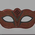 Red Decorative Mask With Gold Black Patterns Ornate Scrolls And Diamond Center Detail
