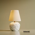 Elegant Modern Table Lamp With Textured White Base And Beige Fabric Shade