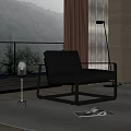 Modern Black Leather Leisure Chair With Metal Frame In Bright Room With Green View