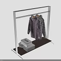 Modern Clothing Rack With Striped Sweaters And Wooden Shelf Holding Boxes