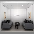 Modern Minimalist Lounge Area With Gray Sofas Black Coffee Table And Wall Paintings