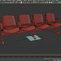 Red Public Seating with Four Connected Chairs and Metal Frame Armrests
