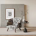 Patterned Accent Chair With Wooden Legs Near Gray Wall Art Vase On Side Table