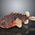 Spiky Brown Striped Porcupine Fish with Large Eyes and Light Fins on Dark Reflective Surface