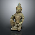 Ancient Bronze Buddha Statue In Seated Posture With Ornate Details And Hand Gestures