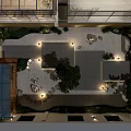 Serene Residential Zen Courtyard Landscape Design With Warm Ambient Night Lighting Natural Stones And Plants