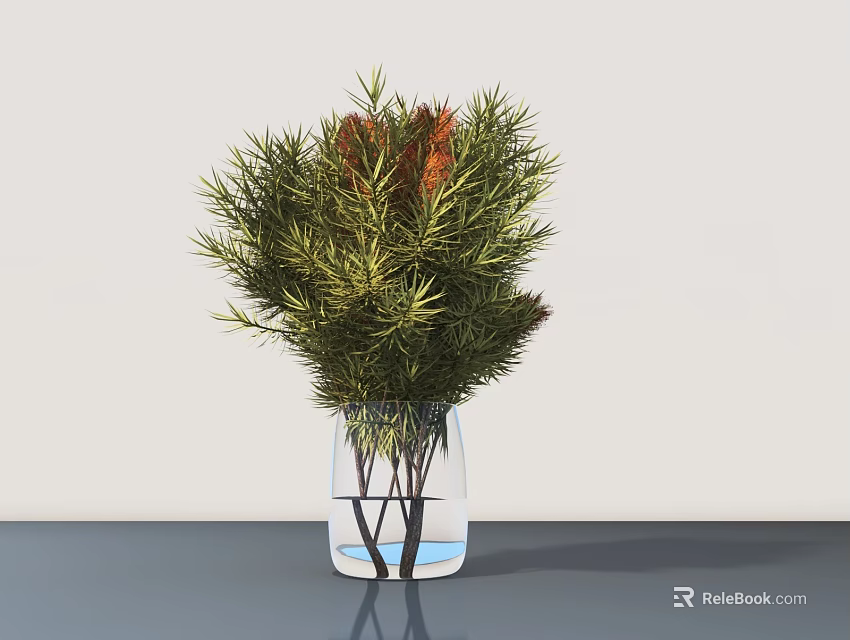 Potted Plant in Transparent Glass Vase with Green Foliage and Orange Flowers on Gray Tabletop against White Background 3d model 